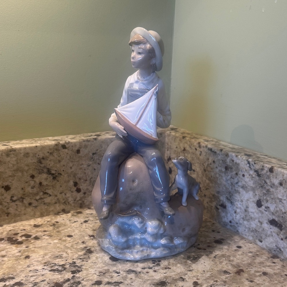 Lladró Porcelain Boy with Sailboat Figurine